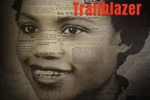 Newspaper print covers the face of Alberta O. Jones