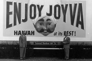 Black and white photo of Joyva's billboard.