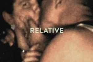 home video screenshot from 1940. Man kissing a woman as she looks into camera.
