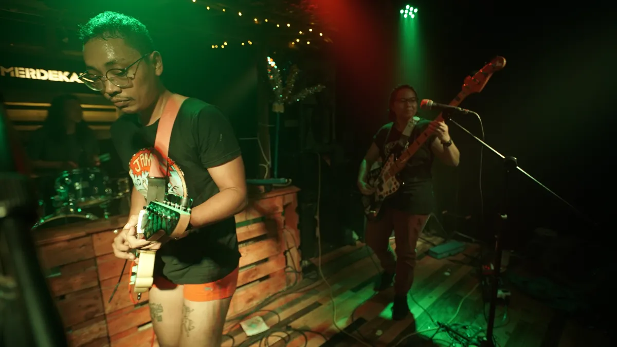 A band playing on a stage.