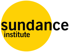 Sundance Institute logo featuring black text and a golden yellow circle