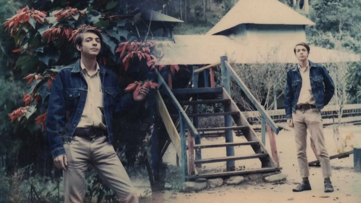 A merged image of two photographs of a young white man in front of Southeast Asia looking buildings.